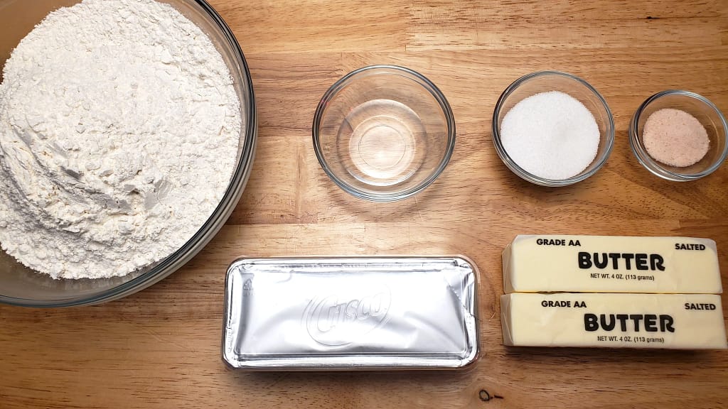 This picture depicts most of the ingredients needed to produce the pie crust as described by this article