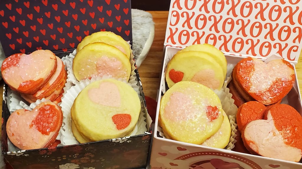 Valentine's Day Icebox Cookies- Leslie Cooks This picture depicts heart shaped and heart imprinted cookies feature in this recipe for valentines day cookies.