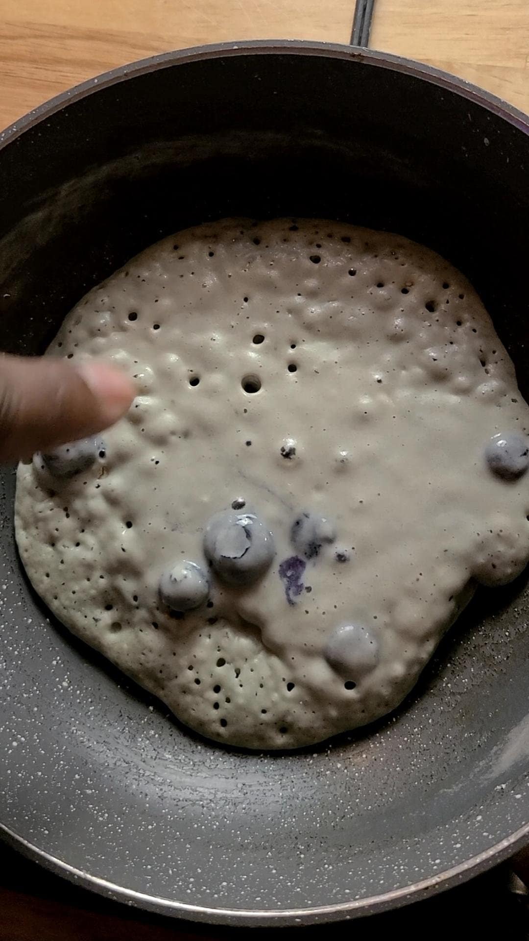 This image depicts a sourdough Discard blueberry pancakes as discussed in the blog post that is bubbly and ready to be flipped.