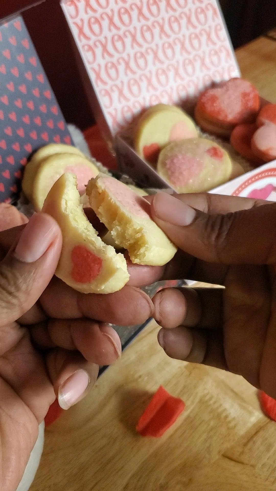 The image depicts breaking one of the icebox cookies featured in this lesliecooks.com recipe blog post.