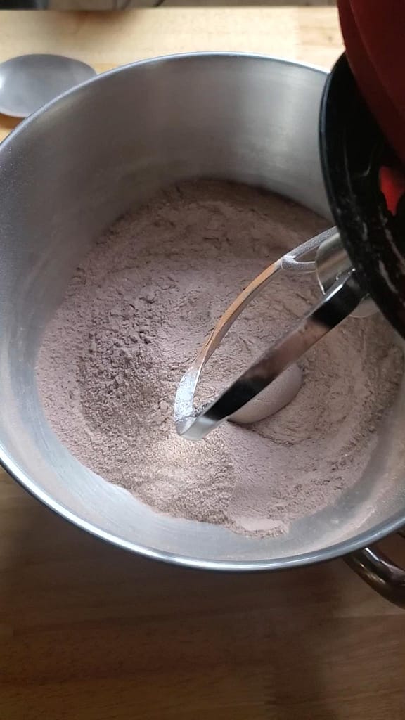 This image depicts dry ingredients mixed together in a mixer bowl